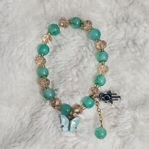 Elegant Beaded Bracelet with Hamsa Charm